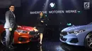 Vice President of Corporate Communications BMW Group Indonesia Jodie O'tania (kanan) bersama Vice President of Sales BMW Indonesia Bayu Riyanto berpose saat peluncuran all new BMW Seri 8 Coupe di Jakarta, Jumat (17/5/2019). BMW Seri 8 Coupe resmi mengaspal di Indonesia. (Liputan6.com/HO/Dani)