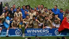 Zenit St Petersburg team celebrate with the trophy after they won the UEFA Cup final match between Scottish football club Glasgow Rangers and Russian side Zenit St Petersburg/ PAUL ELLIS