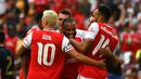 Striker Arsenal Alexandre Lacazette (tengah) berselebrasi dengan rekannya usai mencetak gol ke gawang Real Madrid pada pertandingan ICC 2019 di FedExField, Landover, Maryland (24/7/2019). Madrid menang adu penalti atas Arsenal 3-2 (2-2). (AFP Photo/Andrew Caballero-Reynolds)