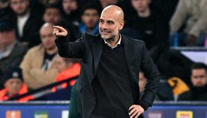 Manajer Manchester City, Pep Guardiola, bereaksi selama pertandingan sepak bola Liga Champions UEFA antara Manchester City dan Borussia Dortmund di Stadion Etihad di Manchester, Inggris barat laut, pada 5 November 2025. (Oli SCARFF / AFP)