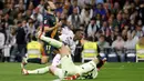 Pemain Real Madrid, Vinicius Junior mencetak gol ke gawang Girona dalam laga lanjutan Liga Spanyol 2024/2025 di Santiago Bernabeu Stadium, Madrid, Minggu (23/02/2025) waktu setempat. (AFP/Pierre-Philippe Marcou)