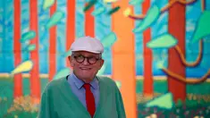 Pelukis terkenal asal Inggris David Hockney berpose saat pembukaan lukisan terbarunya di Paris, Perancis, Selasa (26/9). David Hockney menyumbangkan lukisan terbarunya berjudul "The Arrival of Spring di Woldgate, East Yorkshire." (Foto AP/Francois Mori)