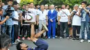 Ketua MPR RI, Zulkifli Hasan (tengah) saat menyaksikan salah satu aksi dari komunitas di Car Fre Day (CFD), Jakarta, Minggu (3/4/2016).(Liputan6.com/Yoppy Renato)