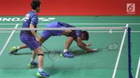 Ganda campuran Indonesia, Tontowi Ahmad/Liliyana Natsir saat gagal mengembalikan bola pasangan China, Zheng Siwei/Huang Yaqiong pada final Indonesia Masters 2018, Jakarta, Minggu (28/1). Owi/Butet kalah 21-14 dan 21-11. (Lipuatan6.com/Angga Yuniar)