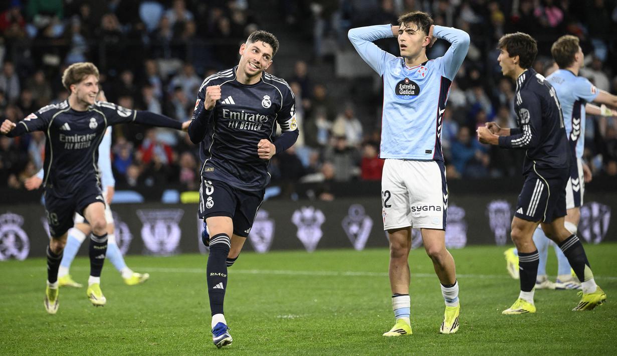 Federico Valverde menjadi kunci kemenangan Real Madrid saat bertandang ke markas Celta Vigo dalam laga lanjutan Liga Spanyol 2025/2026 pada Jumat (06/03/2026) waktu setempat. (AFP/Miguel Riopa)