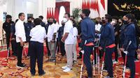 Presiden Jokowi menyambut kedatangan Timnas Sepak Bola Amputasi Indonesia di Istana Negara, Jakarta Pusat pada Rabu 21 September. Foto: Dokumentasi Pribadi.