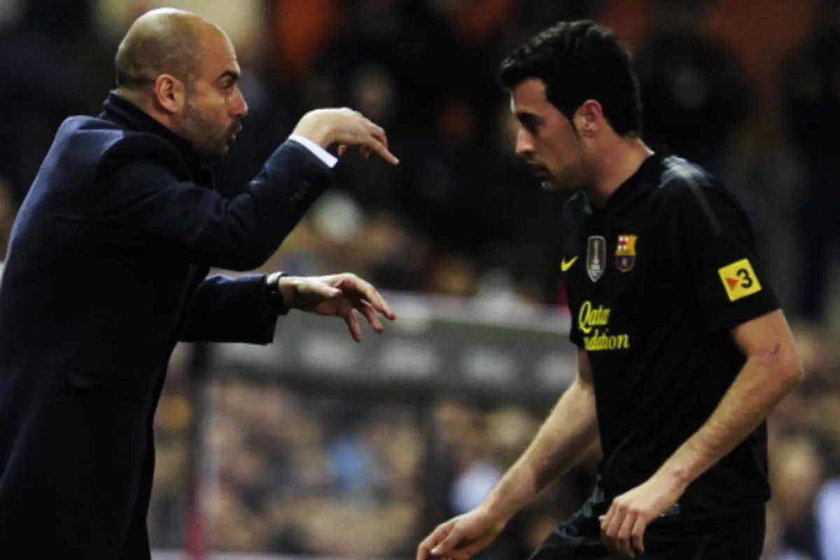 Josep Guardiola dan Sergio Busquets