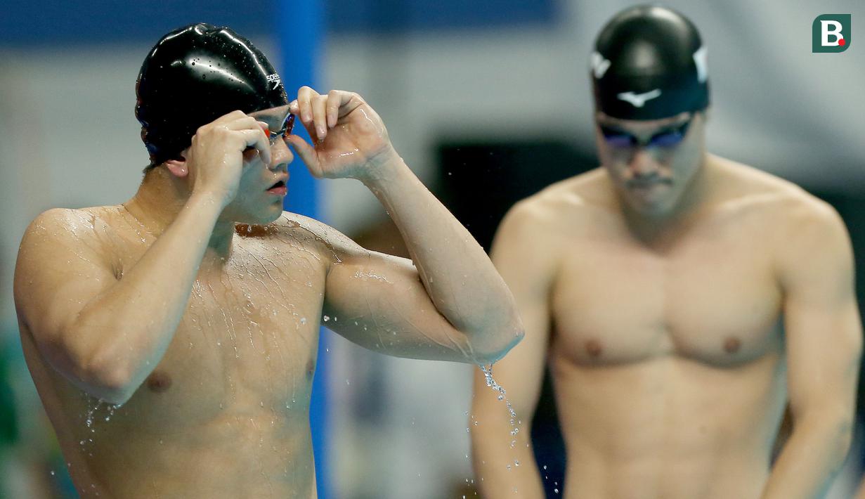 Perenang Singapura, Joseph Schooling, saat beraksi di nomor 100 meter gaya kupu-kupu putra pada Asian Games di Akuatik, GBK, Jakarta, Rabu (22/8/2018). Joseph Schooling sukses persembahkan medali emas pertama untuk Singapura. (Bola.com/Peksi Cahyo)