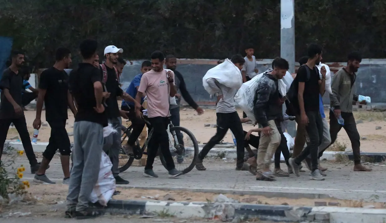 Kesiapan tersebut untuk memastikan distribusi berjalan lancar kepada warga Gaza yang mengalami kelaparan ekstrem akibat perang berkepanjangan. (Eyad BABA/AFP)