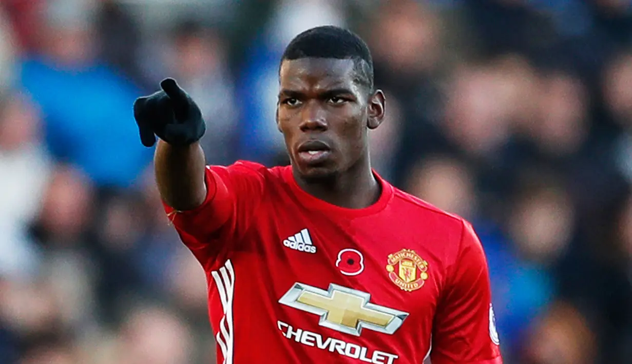 Ekspresi Paul Pogba saat merayakan gol pertama untuk MU pada pertandingan Liga Premier Inggris, Swansea City menjamu Manchester United di Stadion Liberty, Inggris (6/11). Pogba berhasil menyumbang satu gol untuk MU. (Reuters/John Sibley)