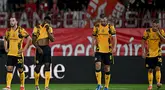 Ekspresi pemain Inter Milan Carlos Augusto, Denzel Dumfries, Stefan de Vrij dan Davide Frattesi (kiri ke kanan) usai laga melawan Monza pada lanjutan Serie A Italia di Stadion Brianteo, Monza, pada 15 September 2024. (Gabriel BOUYS/AFP)