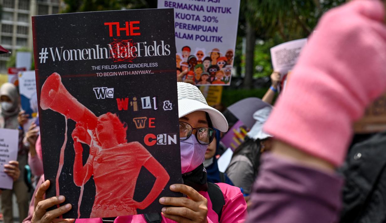 Aliansi Perempuan Indonesia menuntut negara segera menyelesaikan sejumlah kasus kekerasan terhadap perempuan yang selama ini terbengkalai. (BAY ISMOYO/AFP)