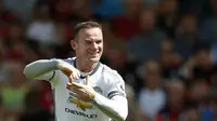 Ekspresi gembira kapten Manchester United, Wayne Rooney usai mencetak gol ke gawang Bournemouth, pada laga perdana Premier League 2016-2017, di Vitality Stadium, Minggu (14/8/2016). Rooney membawa Setan Merah menang 3-1.  (Reuters/Andrew Couldridge)