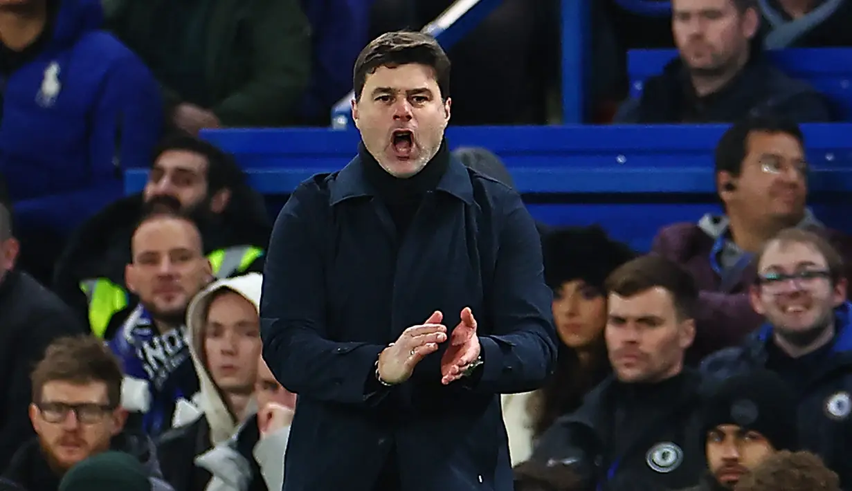 Mauricio Pochettino juga dilaporkan masuk dalam radar FA sebagai calon pelatih baru Timnas Inggris. Pelatih asal Argentina itu punya pengalaman yang kaya di Inggris. Pochettino saat ini sedang menganggur usai cabut dari Chelsea sehingga ia dikabarkan cukup tertarik untuk mengambil pekerjaan ini. (HENRY NICHOLLS / AFP)