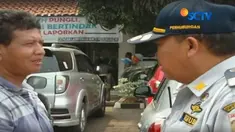 Pengendara mobil mencoba menyuap petugas Dishub Jakarta Barat dengan uang sebesar Rp 100 ribu agar mobilnya tak diderek.