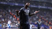 Gelar juara Liga Spanyol musim 2025/2026 milik Barcelona harus ditangguhkan setelah Vinicius Jr berhasil membawa Real Madrid meraih kemenangan atas Espanyol. (AFP/Josep Lago)