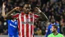 <p>Ivan Toney. Striker Brentford ini total telah mencetak 14 gol dari total 20 laga di semua ajang musim 2022/2023. Ia sementara memuncaki daftar top skor Brentford dengan unggul jauh atas dua legiun asing, Bryan Mbeumo (Kamerun) dan Yoane Wissa (Kongo) yang masing-masing baru mencetak 4 gol. (AFP/Glyn Kirk)</p>