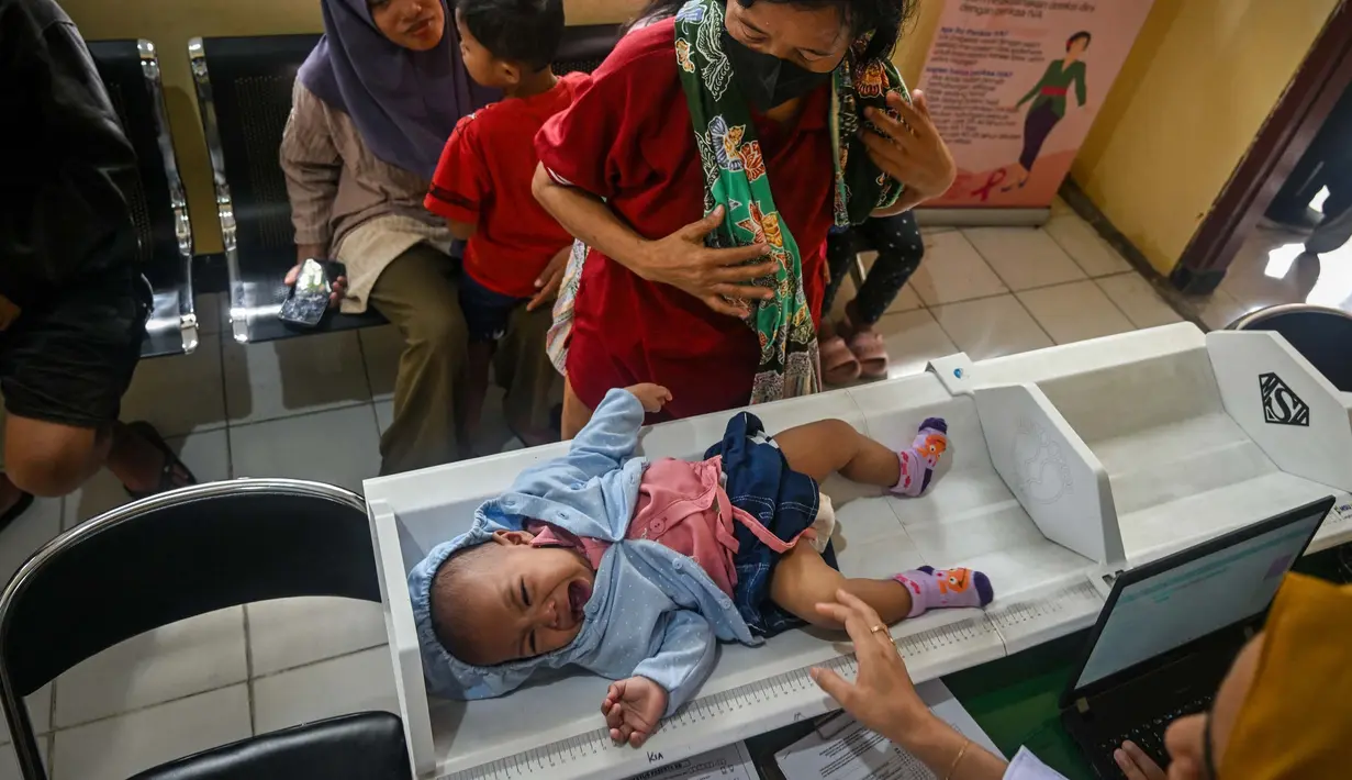 Program ini terbuka bagi seluruh kelompok usia, mulai dari bayi hingga lanjut usia. (JUNI KRISWANTO/AFP)