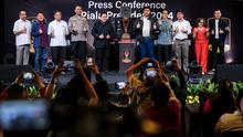 Ketua umum PSSI, Erick Thohir (tengah kiri), Ketua Steering Committee (SC) Piala Presiden 2024, Maruarar Sirait (tengah kanan), dan sejumlah undangan saat konferensi pers yang berlangsung di SCTV Tower, Senayan, Jakarta, Senin (15/07/2024). (Bola.com/Bagaskara Lazuardi)