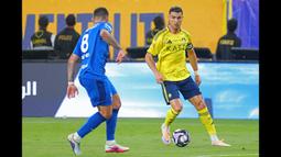 Bermain sebagai starter, Al Nassr berhasil unggul terlebih dahulu pada menit ke-37 melalui gol Mohamed Simakan. (AFP/Fayez Nureldine)