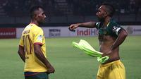 Izaac Wanggai (Persebaya) dan Patrich Wanggai (Sriwijaya FC)