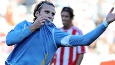 Uruguayan forward Diego Forlan celebrates after scoring the 2nd goal of the final of the 2011 Copa America football tournament held at the Monumental stadium in Buenos Aires, on July 24, 2011.  AFP PHOTO / ALEJANDRO PAGNI