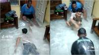 Viral pemuda asyik berenang di ruang tamu saat banjir, netizen justru salfok pada airnya yang jernih. (Sumber: TikTok/sleepymore)