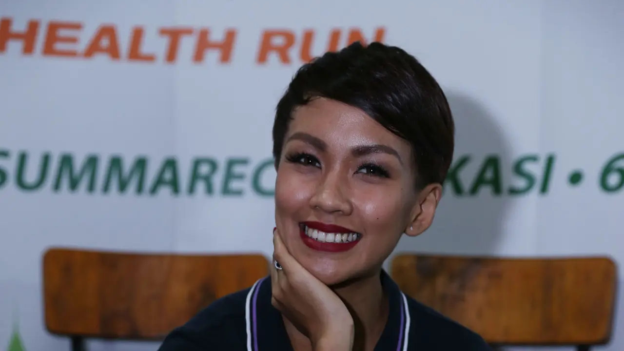 Melanie Putria Ketagihan Berlari