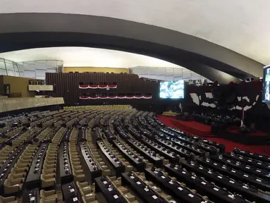 Suasana Rapat Paripurna Pembukaan Masa Sidang III Tahun 2019-2020 di Kompleks Parleman, Jakarta, Senin (30/3/2020). DPR tetap menggelar Rapat Paripurna di tengah pandemi virus corona COVID-19. (Liputan6.com/Johan Tallo)