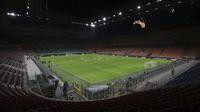 Suasana pertandingan Inter Milan dan Ludogorets yang tanpa penonton di Stadion San Siro, Milan, Italia (27/2/2020). Akibat virus COVID-19 yang sedang mewabawah, pertandingan leg kedua babak 32 besar Liga Europa UEFA antara Inter Milan melawan Ludogorets dimainkan tanpa.(Emilio Andreoli, UEFA via AP)