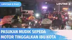Arus mudik menggunakan sepeda motor terpantau mulai bergerak meninggalkan ibu kota. Para pemudik melintasi Simpang Pangkalan Jati, Jalan Raya Kalimalang untuk menuju ke Jalur Pantura.