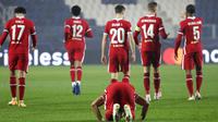 Pemain Liverpool Mohamed Salah melakukan selebrasi usai mencetak gol ke gawang Atalanta pada pertandingan Grup D Liga Champions di Stadion Gewiss, Bergamo, Italia, Selasa (3/11/2020). Liverpool menang 5-0. (AP Photo/Luca Bruno)