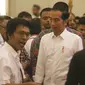 Presiden Joko Widodo tiba menghadiri Halalbihalal bersama aktivis 98 di Jakarta, Minggu (16/6/2019). Dalam silaturahmi tersebut Jokowi dihadiahi jaket bertuliskan Son Of Democracy Indonesia 98 . (Liputan6.com/Angga Yuniar)