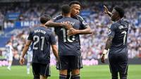 Real Madrid meraih kemenangan 2-1 atas Real Sociead pada laga pekan ke-4 La Liga di&nbsp;Estadio Municipal de Anoeta, Sabtu (13/9/2025) malam WIB. Sayangnya, kemenangan El Real dinodai kartu merah yang didapat&nbsp;Dean Huijsen pada menit ke-32. (AFP/ANDER GILLENEA)