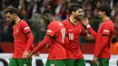 Unggul 3-1, Portugal berhasil meraih poin penuh sekaligus mengokohkan posisi mereka di puncak klasemen grup 1 UEFA Nations League A dengan raihan sembilan poin. (Sergei GAPON/AFP)