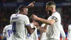 Real Madrid makin dekat dengan gelar juara La Liga 2021/2022 usai membungkam tuan rumah Osasuna 3-1 di pekan ke-33, Kamis (21/4/2022) dini hari WIB. (AFP/Ander Gillenea)