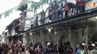 Tradisi Berebut Gula di Komunitas Muslim Padang