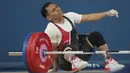 Hasil ini membuat Eko tak berhasil melanjutkan tradisi medali Olimpiade. (AP Photo/Kin Cheung)