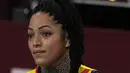 Brenda Castillo dari Republik Dominika mengikat rambutnya saat pertandingan babak penyisihan bola voli putri A antara Republik Dominika dan Kenya pada Olimpiade Tokyo 2020 di Tokyo, Jepang, 31 Juli 2021. (AP Photo/Frank Augstein)