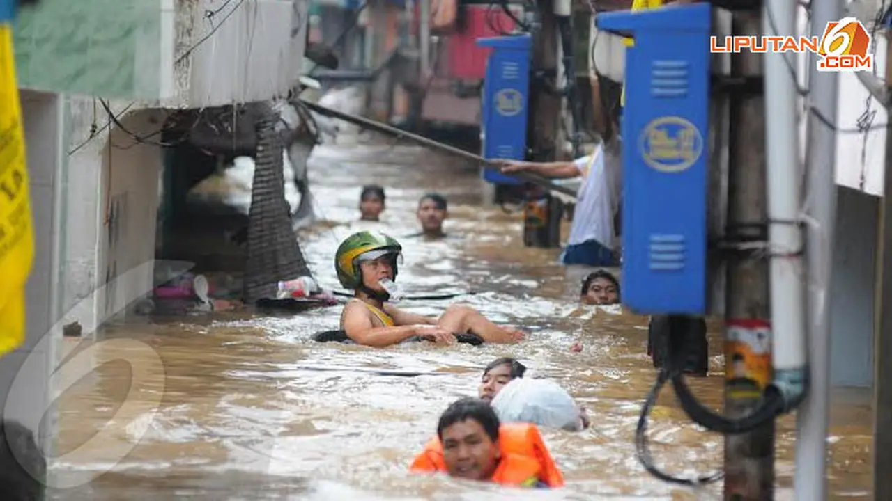 banjir-kampung-pulo-9-140113c.jpg