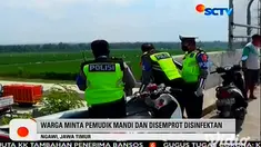 Sebanyak 31 pemudik dari Jakarta diturunkan oleh awak bus antar kota antar provinsi (AKAP), yang mereka tumpangi di jalur Tol Ngawi, Jawa Timur, untuk menghindari penyekatan petugas di pintu tol. Aksi nakal oknum awak bus itu dipergoki warga Desa Nga...