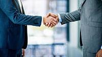 Ilustrasi Malaysia dan Indonesia Bekerja Sama. (iStockphoto)