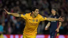 Ekspresi striker Barcelona, Luis Suarez, setelah mencetak gol ke gawang Atletico Madrid pada leg pertama perempat final Liga Champions di Stadion Camp Nou, Rabu (6/4/2016) dini hari WIB. (AFP/Lluis Gene)