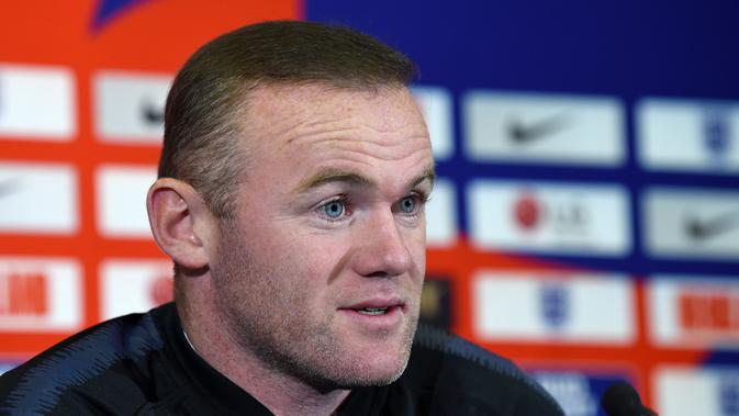 Sebelumnya, Wayne Rooney dikabarkan sempat menolak panggilan tersebut. Rooney beralasan hanya ingin mendapatkan waktu yang tepat untuk tampil bersama timnas Inggris. (AFP/Paul Ellis)