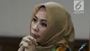Terdakwa dugaan suap terhadap mantan anggota DPR dari Fraksi Golkar Bowo Sidik Pangarso terkait kerja sama bidang pelayaran, Asty Winasti saat sidang lanjutan di Pengadilan Tipikor, Jakarta, Rabu (31/7/2019). Sidang mendengar keterangan saksi ahli dan terdakwa. (Liputan6.com/Helmi Fithriansyah)