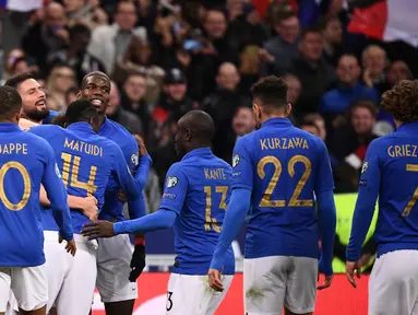 Perayaan gol Antoine Griezmann pada laga kedua Kualifikasi Piala Eropa 2020 Grup H yang berlangsung di Stadion Stade de France, Paris, Selasa (26/3). Perancis menang 4-0 atas Islandia. (AFP/Franck Fife)