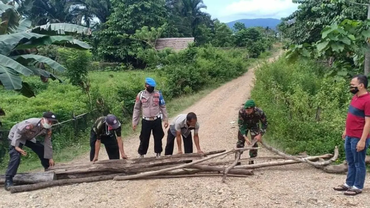 Upaya Pemda dan aparat di Konawe Utara menjaga wilayahnya bebas dari Covid-19.(Liputan6.com/Ahmad Akbar Fua)