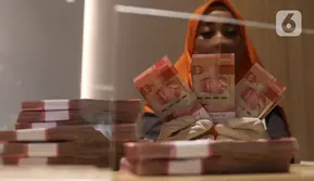 Rupiah Dibuka Melemah ke 17.997 per Dolar AS, Investor Cermati The Fed