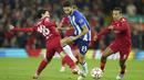 Liverpool yang sudah memastikan tiket lolos tetap tampil serius meladeni lawannya. Mereka berkali-kali menggempur jantung pertahanan FC Porto. (AP/Jon Super)