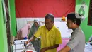 KPU Kota Tangerang memanfaatkan hari Minggu sebagai waktu yang tepat untuk menggelar pemungutan suara susulan. (Liputan6.com/Angga Yuniar)